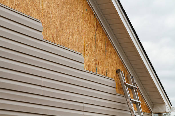 Professional Siding Installation technician working in Burlington, NC